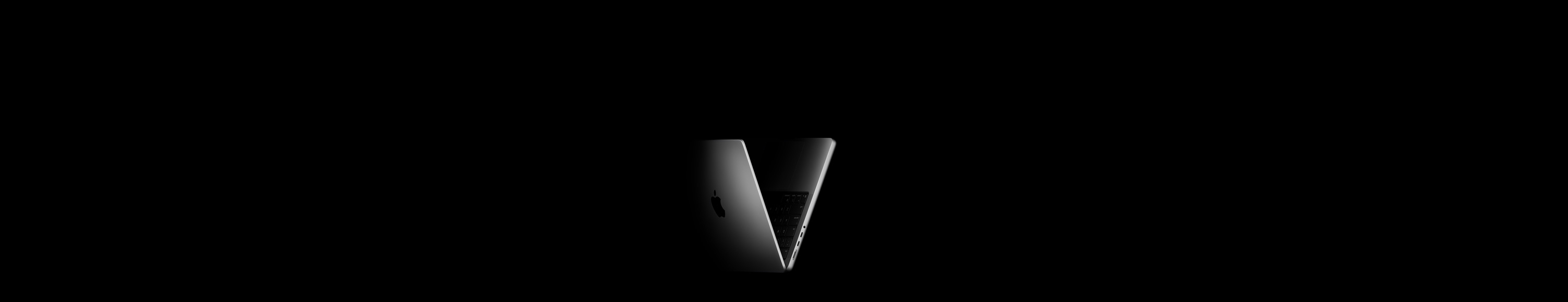 MacBook Pro positioned into the shape of a V, referencing the M5 chip family